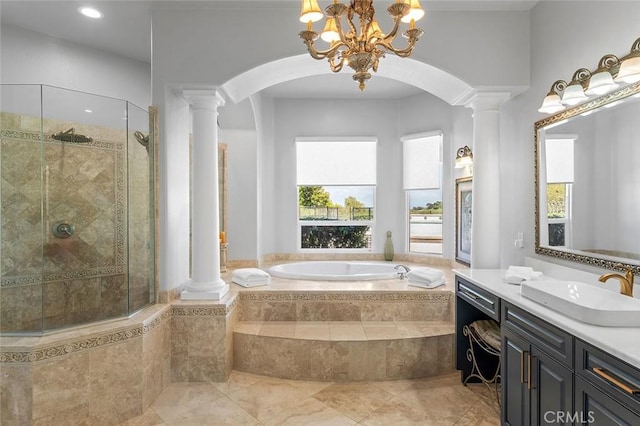 41653 Oak Trail Ct, Murrieta, CA 92562 - full bath featuring ornate columns, a garden tub, a shower stall, plenty of natural light, and recessed lighting