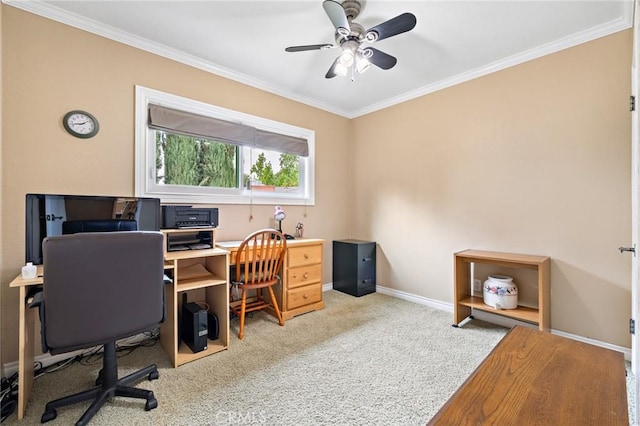 office with ornamental molding, baseboards, carpet floors, and a ceiling fan