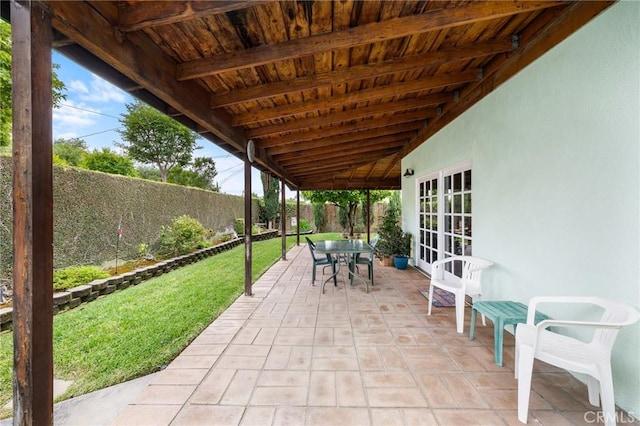 view of patio / terrace featuring french doors and outdoor dining space