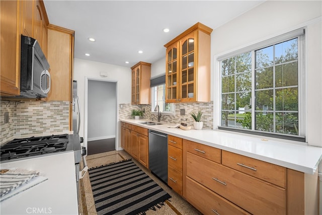 3113 San Anseline Ave, Long Beach, CA 90808 - kitchen featuring appliances with stainless steel finishes, a sink, recessed lighting, light countertops, and tasteful backsplash