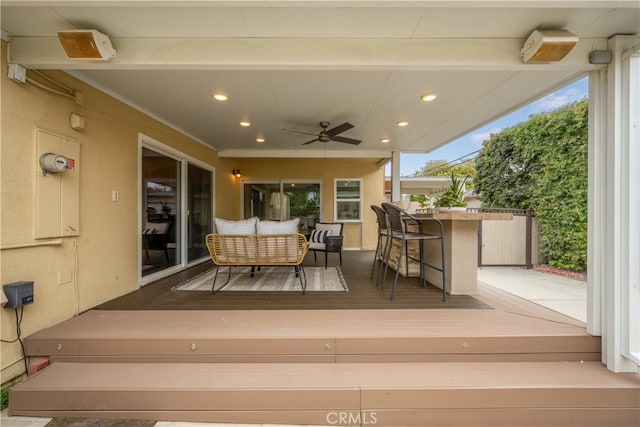 3113 San Anseline Ave, Long Beach, CA 90808 - deck featuring a ceiling fan and an outdoor living space