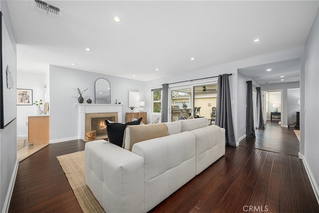 3113 San Anseline Ave, Long Beach, CA 90808 - living room with baseboards, hardwood / wood-style floors, recessed lighting, and a lit fireplace