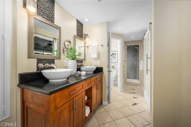 3113 San Anseline Ave, Long Beach, CA 90808 - full bath with a stall shower, toilet, tile patterned floors, double vanity, and recessed lighting
