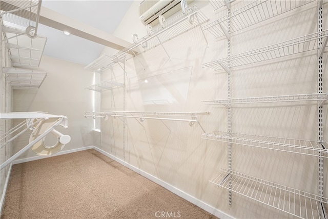 3113 San Anseline Ave, Long Beach, CA 90808 - spacious closet with a wall mounted air conditioner and carpet floors