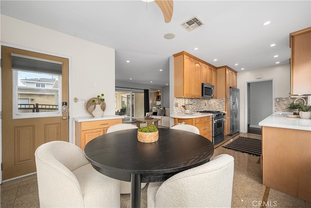 3113 San Anseline Ave, Long Beach, CA 90808 - dining area featuring granite floors, recessed lighting, ceiling fan, and plenty of natural light