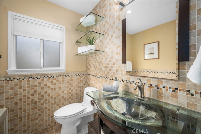 3113 San Anseline Ave, Long Beach, CA 90808 - bathroom with tile walls, toilet, and vanity