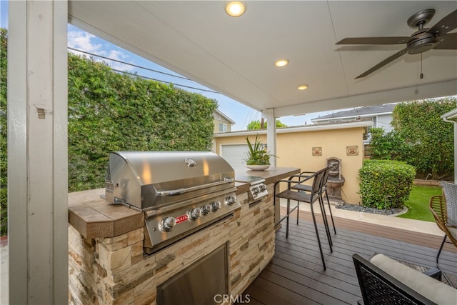 3113 San Anseline Ave, Long Beach, CA 90808 - deck featuring a grill, exterior kitchen, a ceiling fan, and outdoor dining area