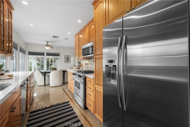 3113 San Anseline Ave, Long Beach, CA 90808 - kitchen featuring appliances with stainless steel finishes, granite floors, tasteful backsplash, recessed lighting, and glass insert cabinets