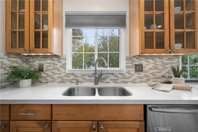 3113 San Anseline Ave, Long Beach, CA 90808 - kitchen with dishwasher, a sink, light countertops, glass insert cabinets, and decorative backsplash