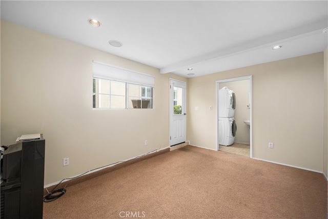 3113 San Anseline Ave, Long Beach, CA 90808 - unfurnished bedroom featuring stacked washer / drying machine, light colored carpet, recessed lighting, and baseboards