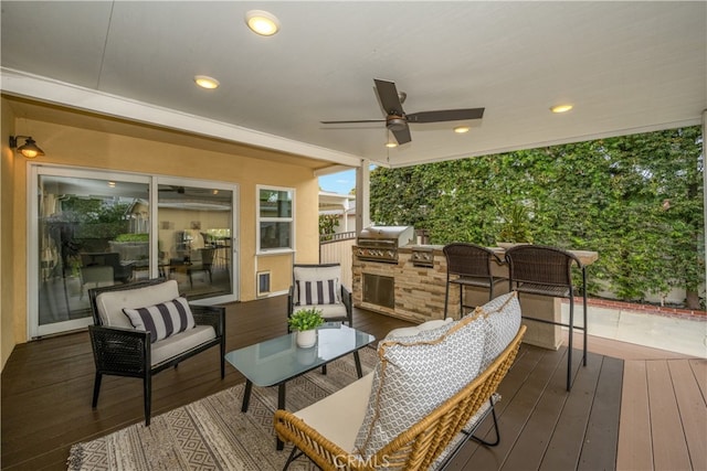 3113 San Anseline Ave, Long Beach, CA 90808 - wooden terrace with an outdoor kitchen, grilling area, ceiling fan, and an outdoor living space