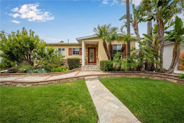 3113 San Anseline Ave, Long Beach, CA 90808 - view of front of property featuring a front yard and stucco siding