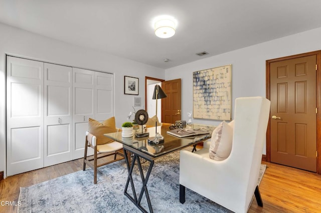 office space featuring wood finished floors