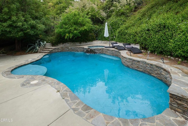 1445 Washburn Rd, Pasadena, CA 91105 - view of pool featuring a patio area and a pool with connected hot tub