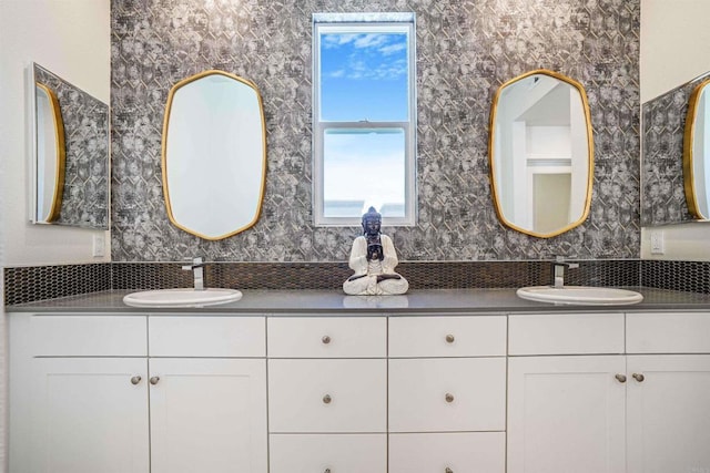 1445 Suwerte Ave Unit 4, Chula Vista, CA 91915 - bathroom featuring double vanity and decorative backsplash