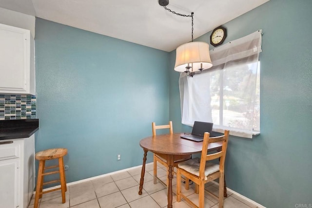 3113 Buena Hills Dr, Oceanside, CA 92056 - dining space with baseboards and light tile patterned floors