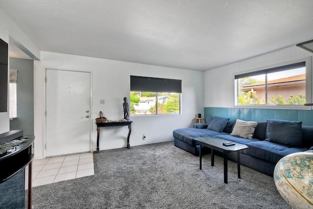 3113 Buena Hills Dr, Oceanside, CA 92056 - carpeted living room featuring healthy amount of natural light and tile patterned floors