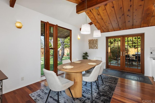 dining room with french doors, plenty of natural light, wood finished floors, and baseboards