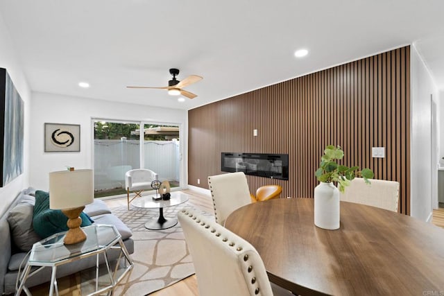 dining room featuring light wood-style floors, ceiling fan, and recessed lighting