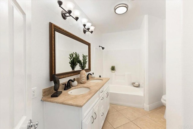 12370 Carmel Country Rd Unit 305, San Diego, CA 92130 - bathroom with tile patterned floors, toilet, washtub / shower combination, double vanity, and baseboards