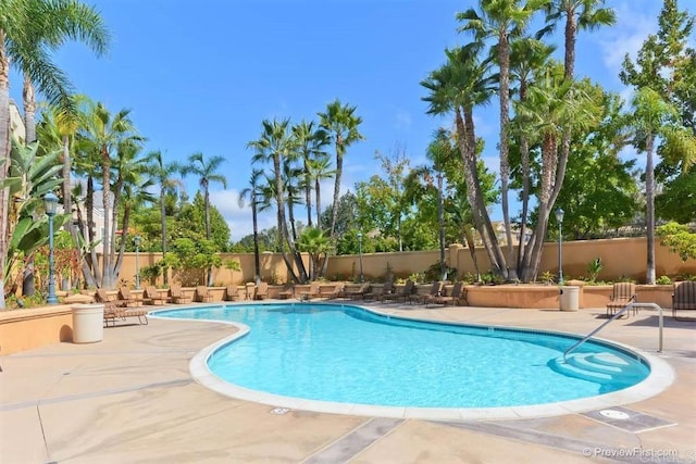 12370 Carmel Country Rd Unit 305, San Diego, CA 92130 - community pool featuring fence and a patio area