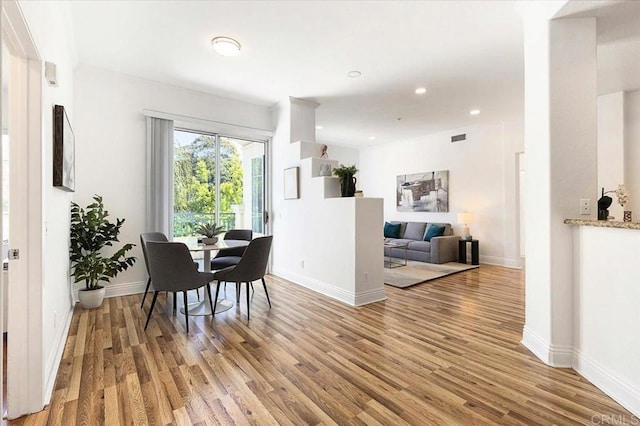 12370 Carmel Country Rd Unit 305, San Diego, CA 92130 - dining room featuring light wood-type flooring, baseboards, and recessed lighting