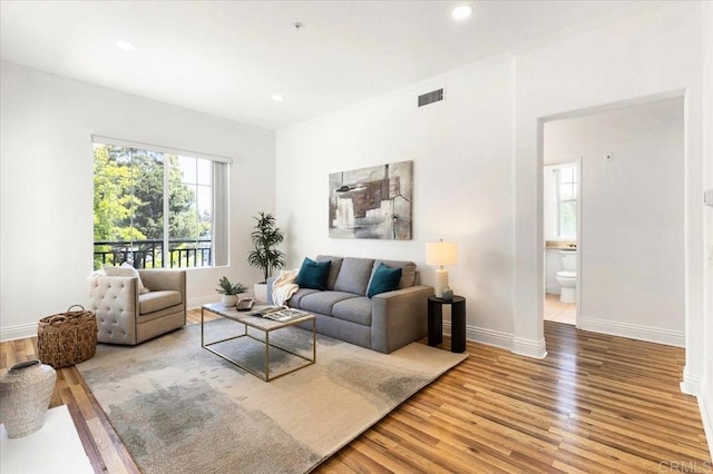 12370 Carmel Country Rd Unit 305, San Diego, CA 92130 - living area with wood finished floors, baseboards, and recessed lighting