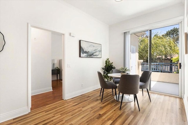 12370 Carmel Country Rd Unit 305, San Diego, CA 92130 - dining area with light wood finished floors and baseboards