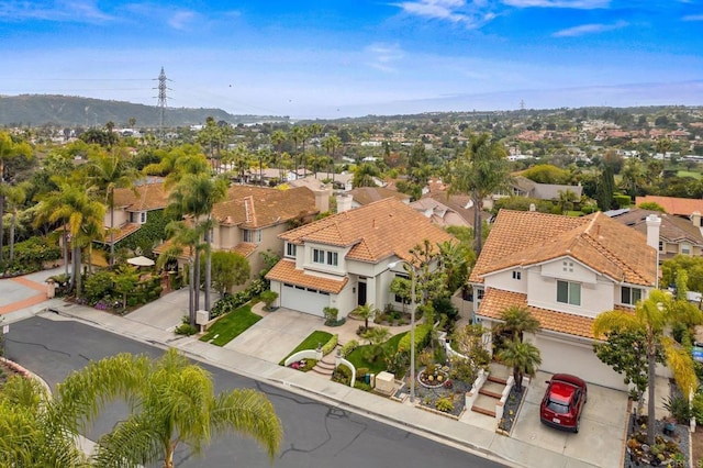 aerial perspective of suburban area featuring mountains