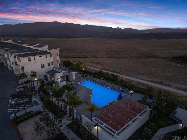 1840 Mint Unit 6, Chula Vista, CA 91915 - aerial view at dusk of view of pool area and a mountain view
