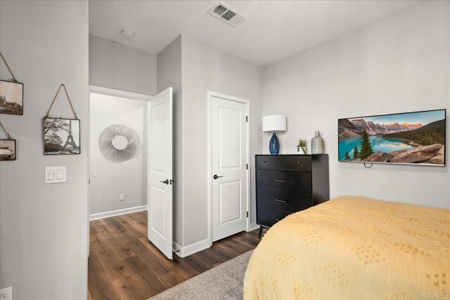 1840 Mint Unit 6, Chula Vista, CA 91915 - bedroom with dark wood-style floors and baseboards