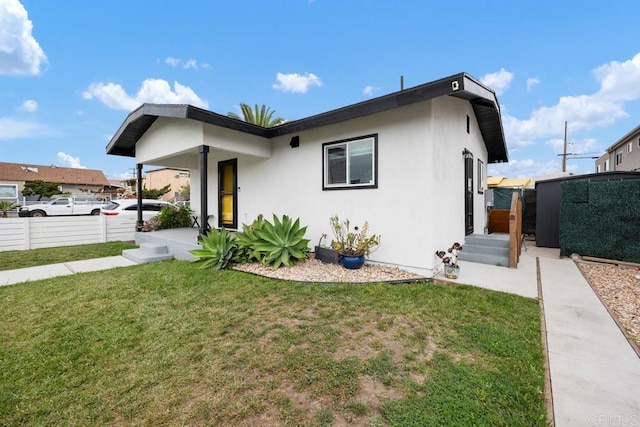 ranch-style house featuring stucco siding and covered porch