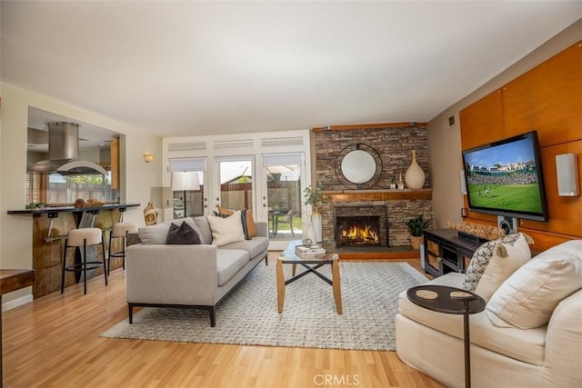 24111 Marathon St, Mission Viejo, CA 92691 - living area with wood finished floors and a fireplace