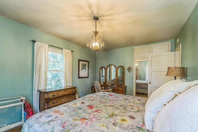 bedroom featuring a chandelier