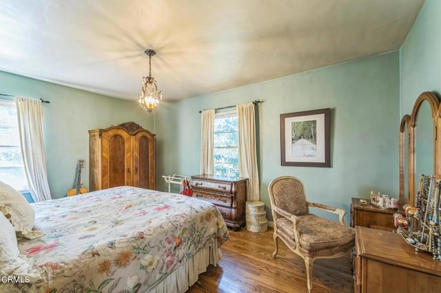 bedroom featuring wood finished floors