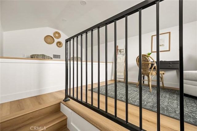 2153 Stanbridge Ave, Long Beach, CA 90815 - stairway with wood finished floors, baseboards, and vaulted ceiling