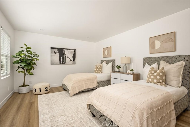 2153 Stanbridge Ave, Long Beach, CA 90815 - bedroom featuring wood finished floors and baseboards