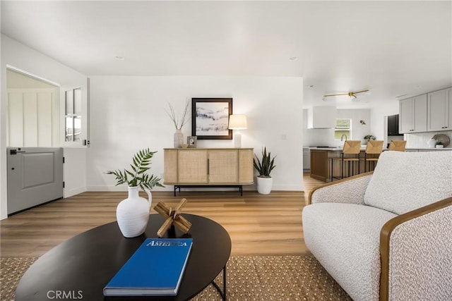 2153 Stanbridge Ave, Long Beach, CA 90815 - living room with light wood-style floors and baseboards