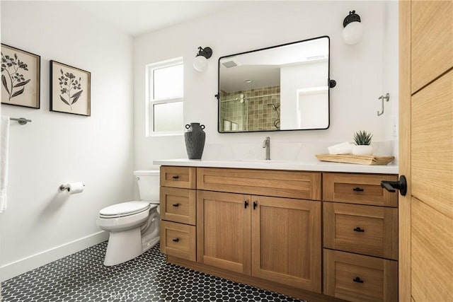 2153 Stanbridge Ave, Long Beach, CA 90815 - bathroom featuring toilet, baseboards, a tile shower, and vanity
