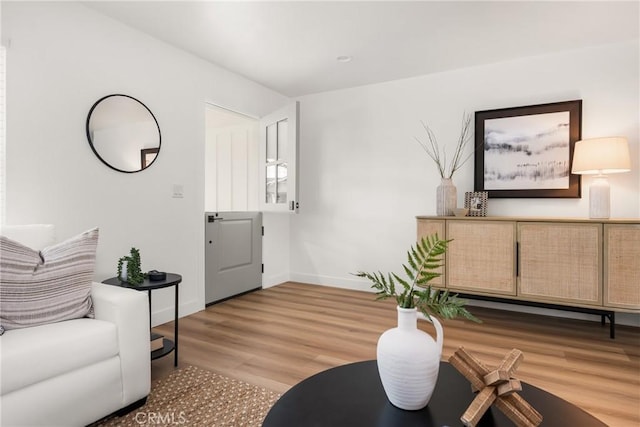 2153 Stanbridge Ave, Long Beach, CA 90815 - living area featuring wood finished floors and baseboards