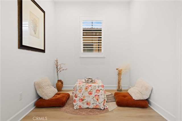 54 Painted Cameo, Irvine, CA 92602 - living area featuring wood finished floors and baseboards