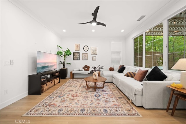 54 Painted Cameo, Irvine, CA 92602 - living room featuring crown molding, ceiling fan, light wood-style floors, baseboards, and recessed lighting