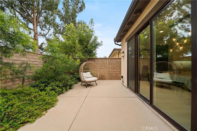 54 Painted Cameo, Irvine, CA 92602 - view of patio with fence and a balcony