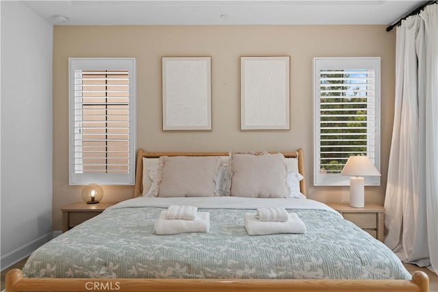 54 Painted Cameo, Irvine, CA 92602 - bedroom with multiple windows and baseboards
