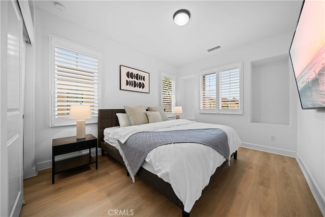 54 Painted Cameo, Irvine, CA 92602 - bedroom with light wood-style floors and baseboards