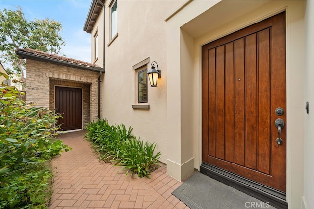 54 Painted Cameo, Irvine, CA 92602 - property entrance featuring stucco siding