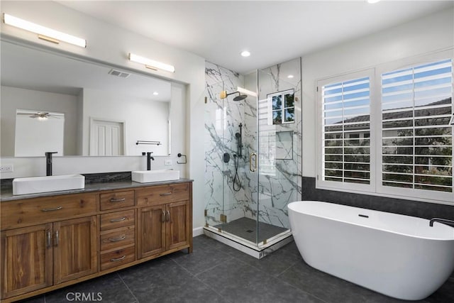 6 Heatherwood, Irvine, CA 92620 - bathroom featuring tile patterned floors, a marble finish shower, double vanity, a ceiling fan, and recessed lighting