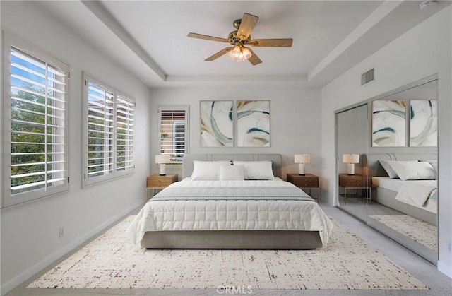 6 Heatherwood, Irvine, CA 92620 - bedroom with a raised ceiling, baseboards, and ceiling fan