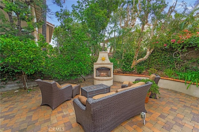 6 Heatherwood, Irvine, CA 92620 - view of patio with a lit fireplace