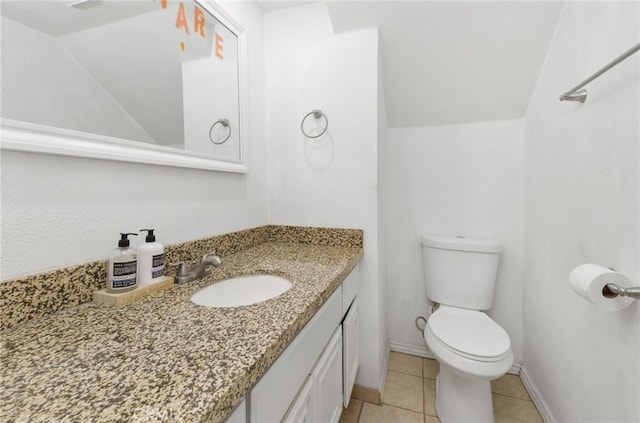 24471 New Haven Dr, Murrieta, CA 92562 - bathroom with lofted ceiling, toilet, vanity, tile patterned flooring, and baseboards